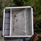 Stainless steel wedge wire screen prefilter with integrated biological media for small ponds.